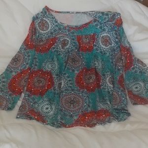Multi color tunic top. Pit to pit is aprox 24 in . Should to bottom hem ls 30